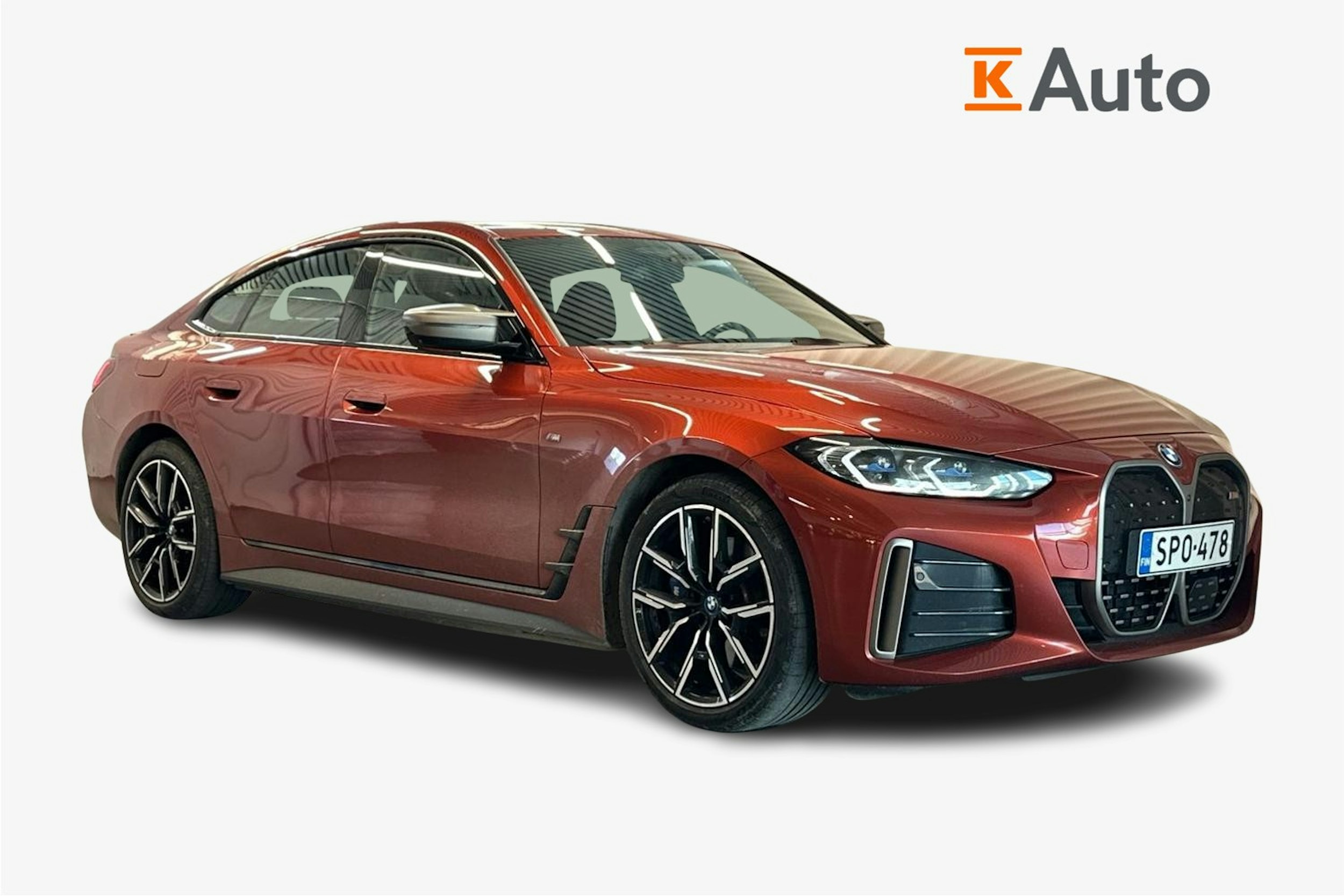 oranssi BMW i4 2024 kuva 1.