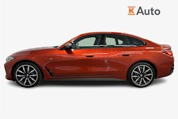 oranssi BMW i4 2024 kuva 6.