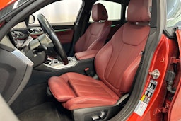 oranssi BMW i4 2024 kuva 14.