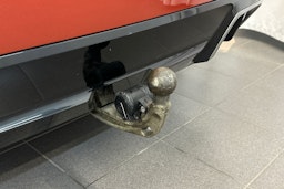 oranssi BMW i4 2024 kuva 18.