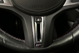 musta BMW i4 M50 2024 kuva 27.