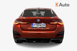 oranssi BMW i4 M50 2024 kuva 3.