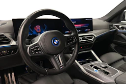 oranssi BMW i4 M50 2024 kuva 6.