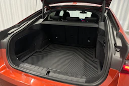 oranssi BMW i4 M50 2024 kuva 36.