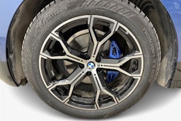 sininen BMW IX M60 2024 kuva 11.