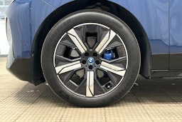 sininen BMW iX M60 2024 kuva 35.