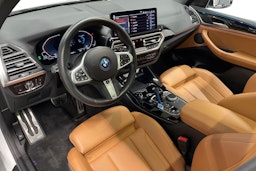 Valkoinen BMW iX3 2023 kuva 7.