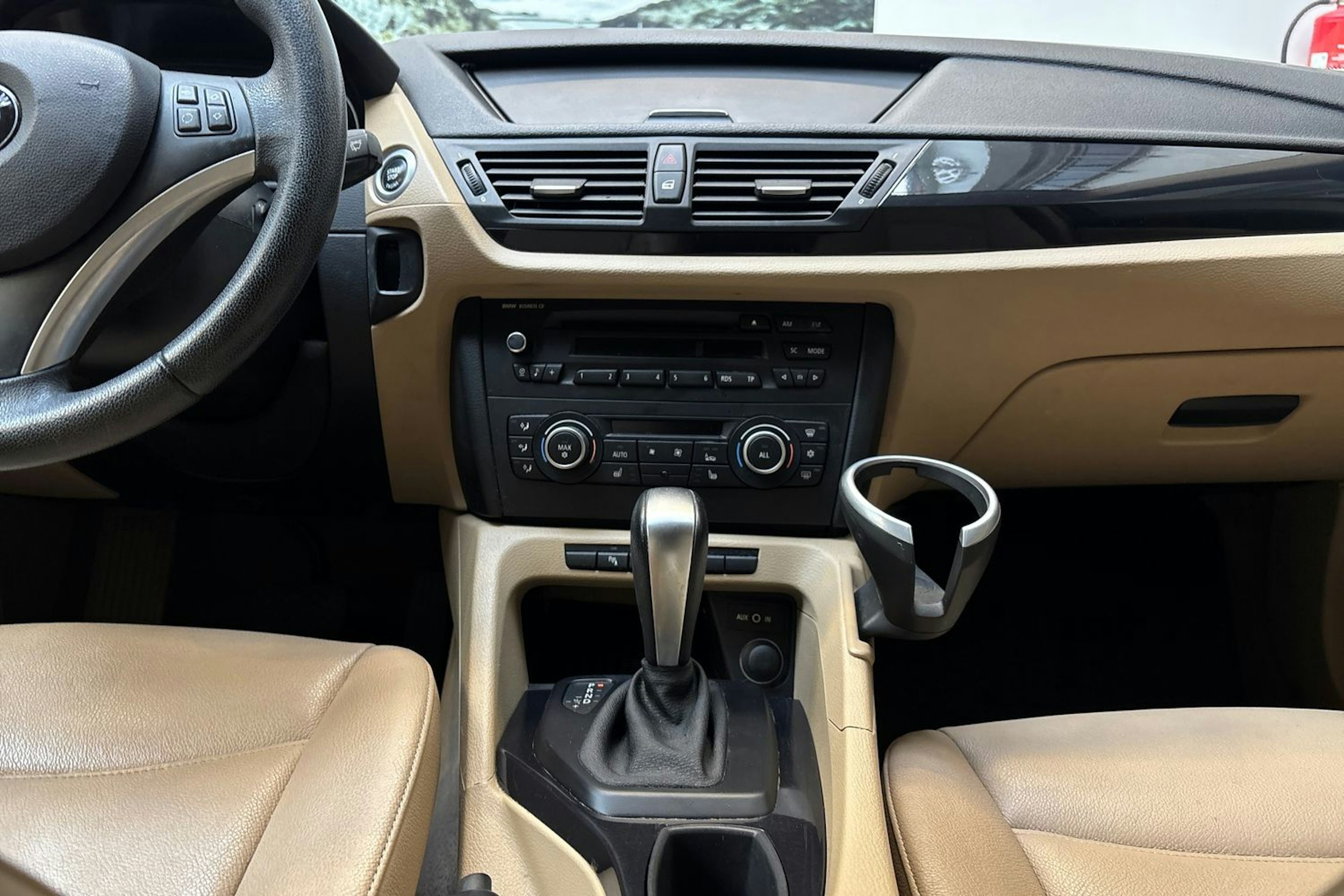 musta BMW X1 2009 kuva 16.