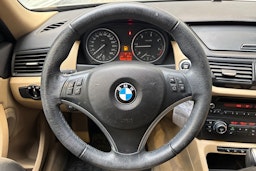 musta BMW X1 2009 kuva 19.