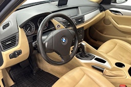 musta BMW X1 2010 kuva 7.