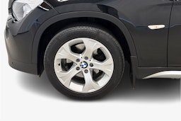 musta BMW X1 2010 kuva 11.