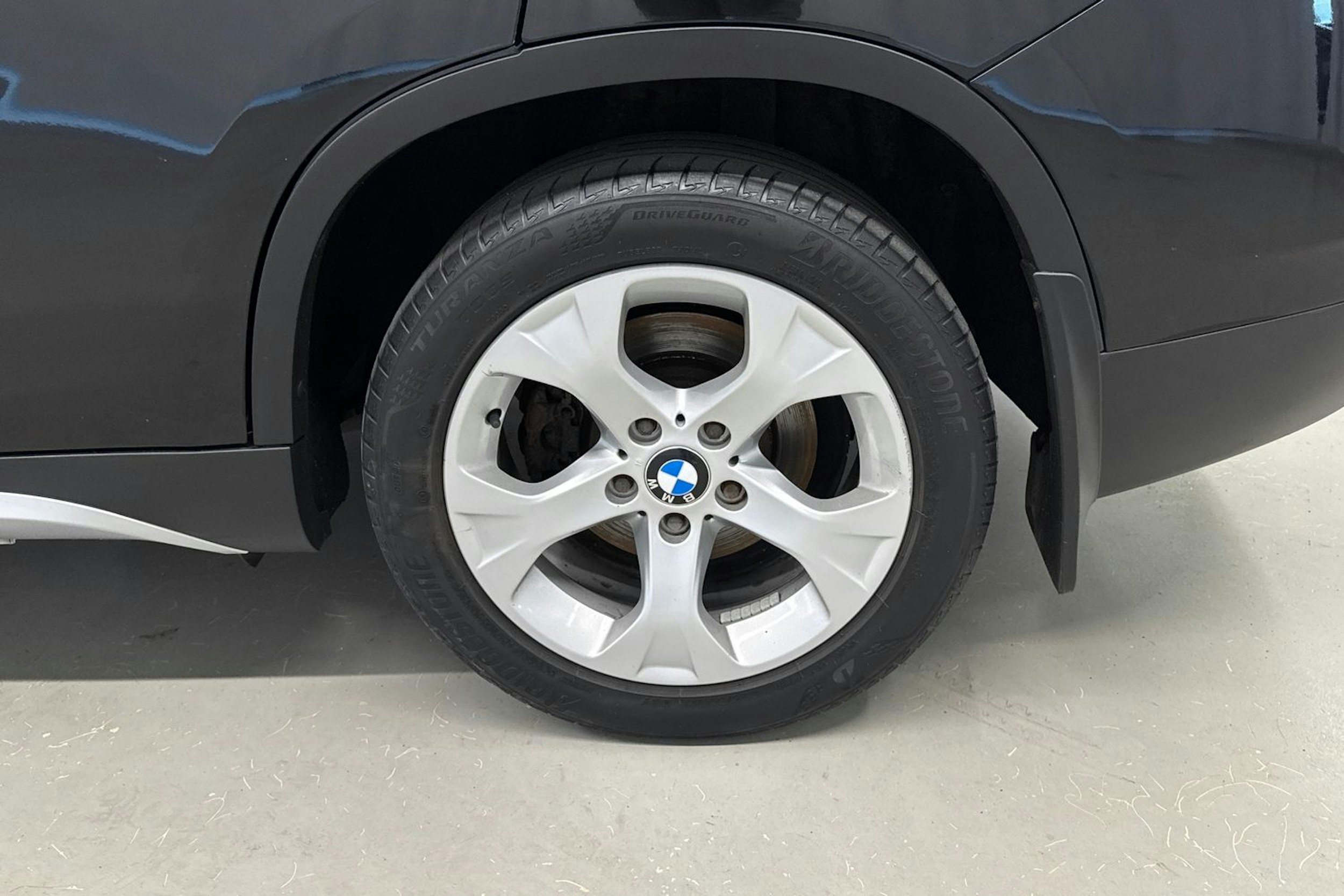 musta BMW X1 2010 kuva 13.
