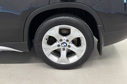 musta BMW X1 2010 kuva 13.