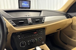 musta BMW X1 2010 kuva 16.