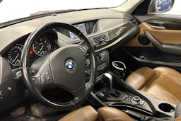 musta BMW X1 2010 kuva 3.