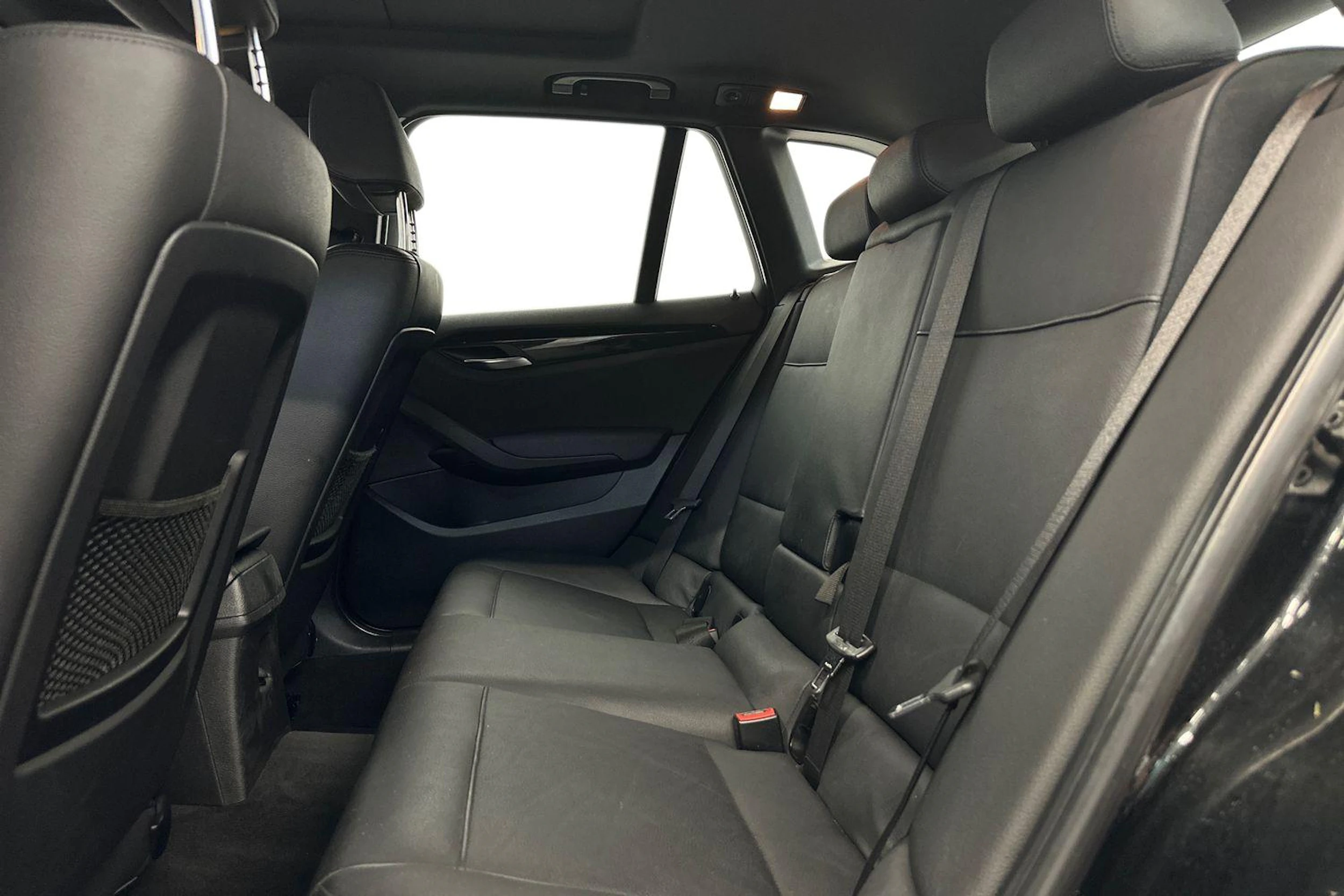 musta BMW X1 2010 kuva 8.