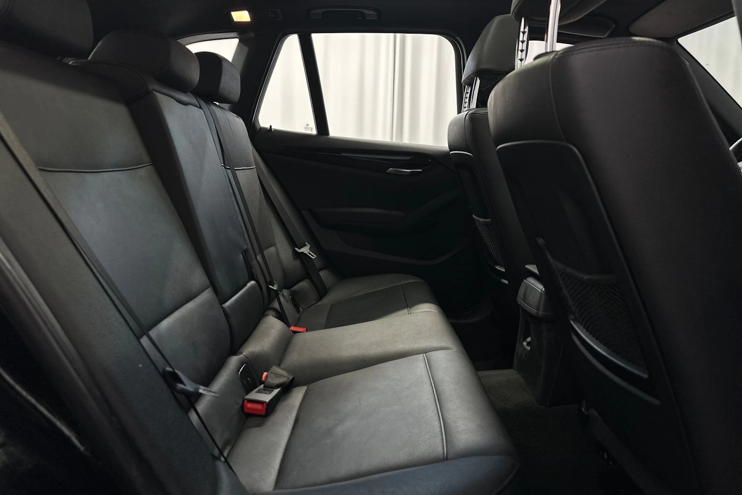 musta BMW X1 2010 kuva 10.