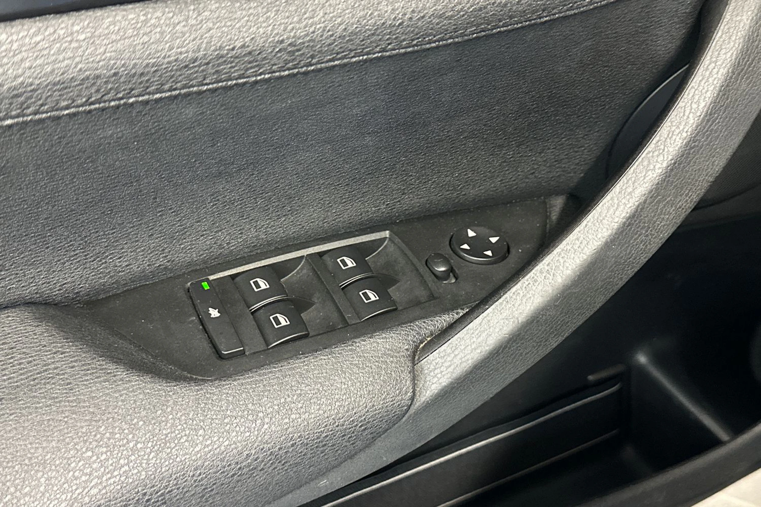 musta BMW X1 2010 kuva 14.