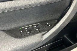 musta BMW X1 2010 kuva 14.