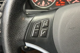 musta BMW X1 2010 kuva 16.