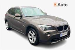 ruskea (beige) BMW X1 2010 kuva 1.