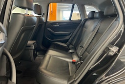 musta BMW X1 2012 kuva 8.
