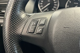 musta BMW X1 2012 kuva 12.
