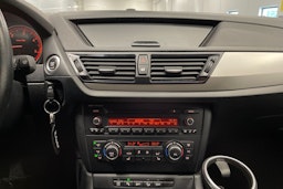 musta BMW X1 2013 kuva 17.