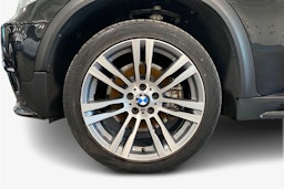 musta BMW X5 2011 kuva 9.
