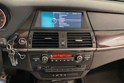 musta BMW X5 2011 kuva 16.