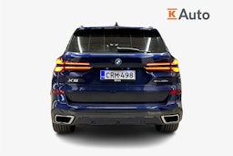 sininen BMW X5 2023 kuva 3.