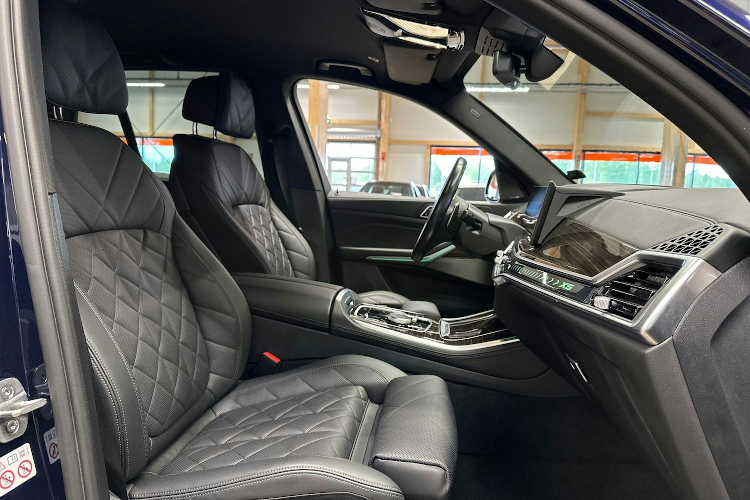 sininen BMW X5 2023 kuva 13.