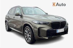 Vihreä BMW X5 xDrive50e kuva 1.
