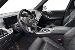 Vihreä BMW X5 xDrive50e kuva 3.