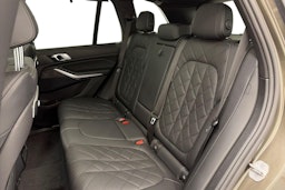 Vihreä BMW X5 xDrive50e 2024 kuva 10.