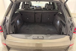 Vihreä BMW X5 xDrive50e 2024 kuva 13.