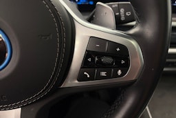 Vihreä BMW X5 xDrive50e 2024 kuva 22.