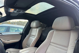 musta BMW X6 2012 kuva 4.