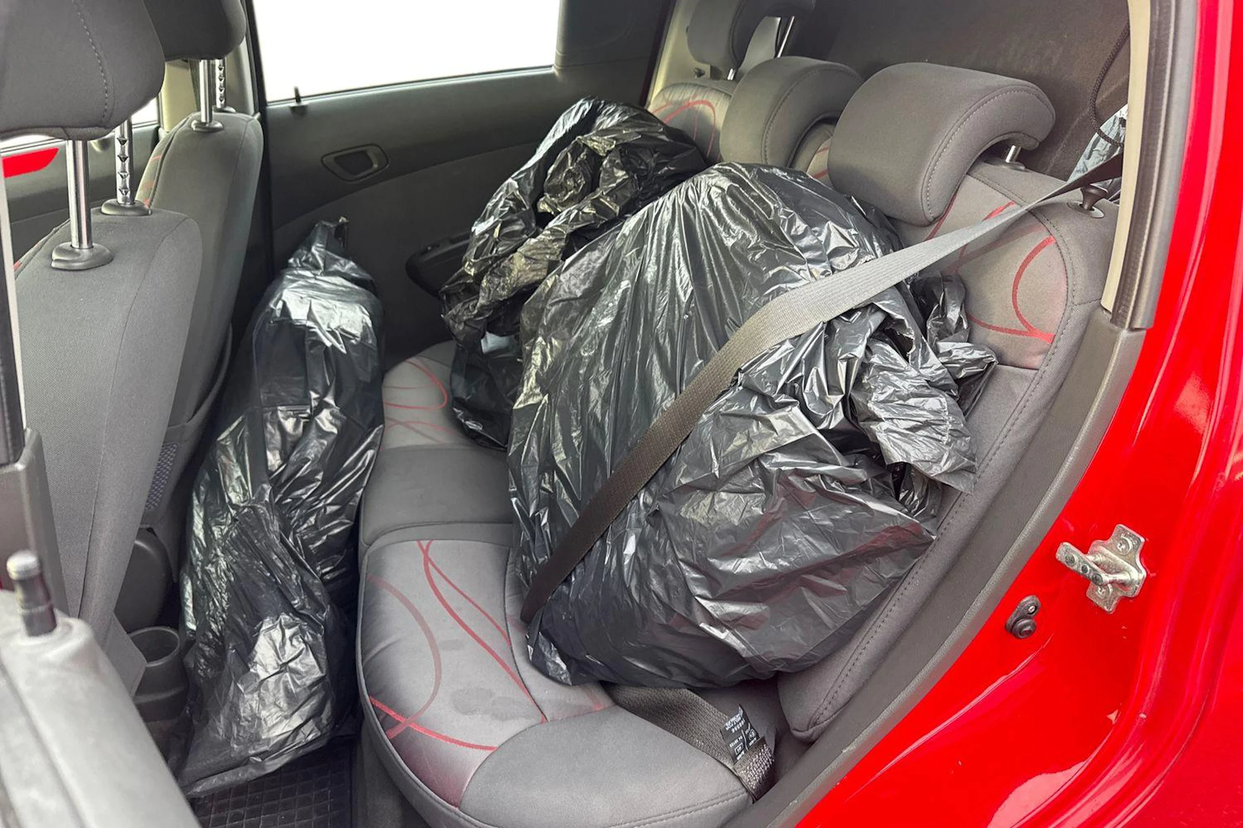 punainen Chevrolet Spark 2011 kuva 8.