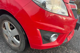 punainen Chevrolet Spark 2011 kuva 12.