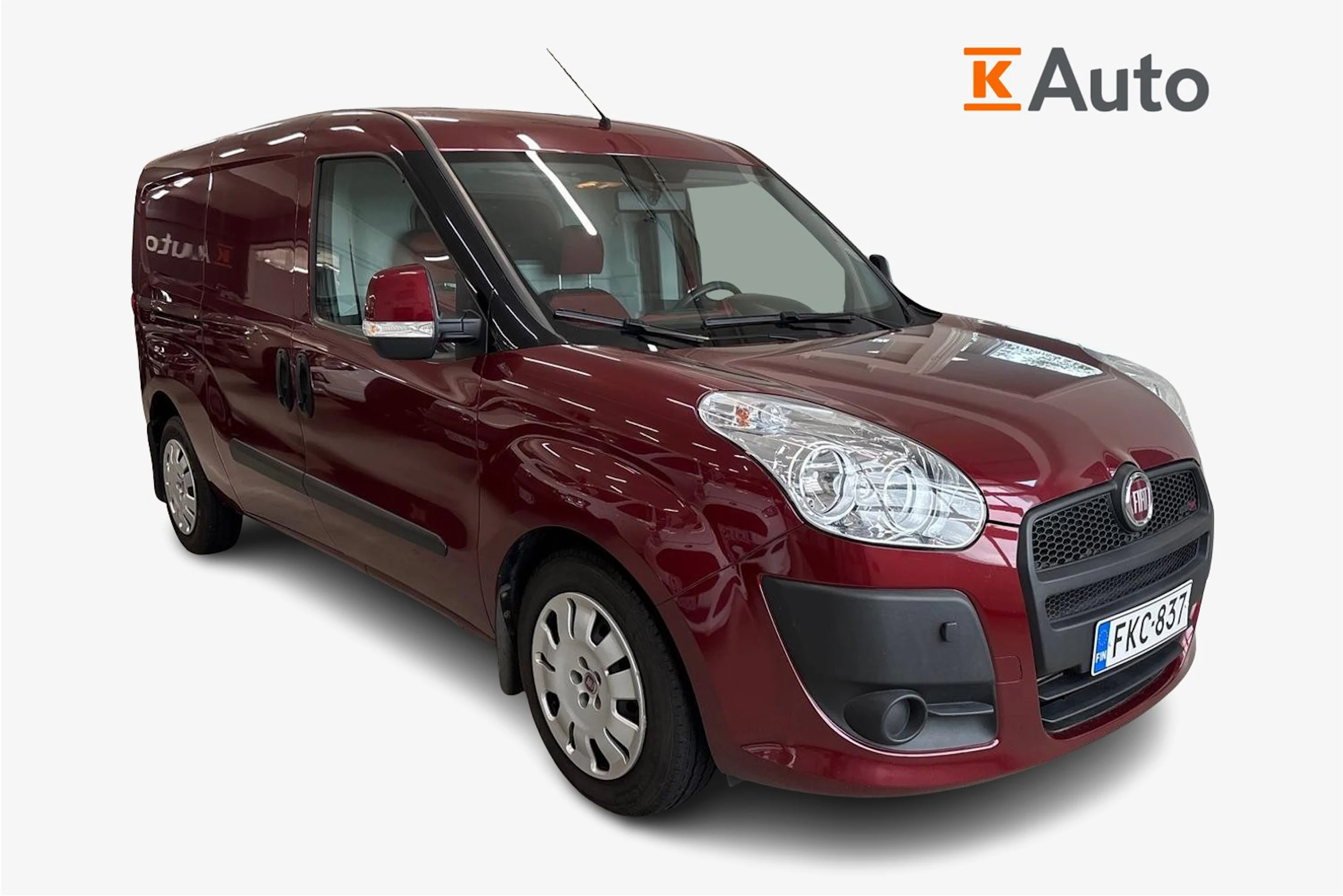 Punainen Fiat Doblo 2011 kuva 1.