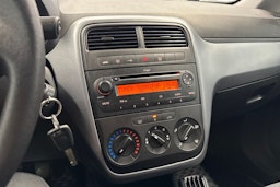 punainen Fiat Grande Punto 2010 kuva 15.