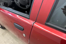punainen Fiat Punto 2006 kuva 17.