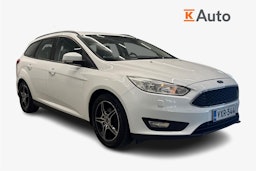 valkoinen Ford Focus 2015 kuva 1.