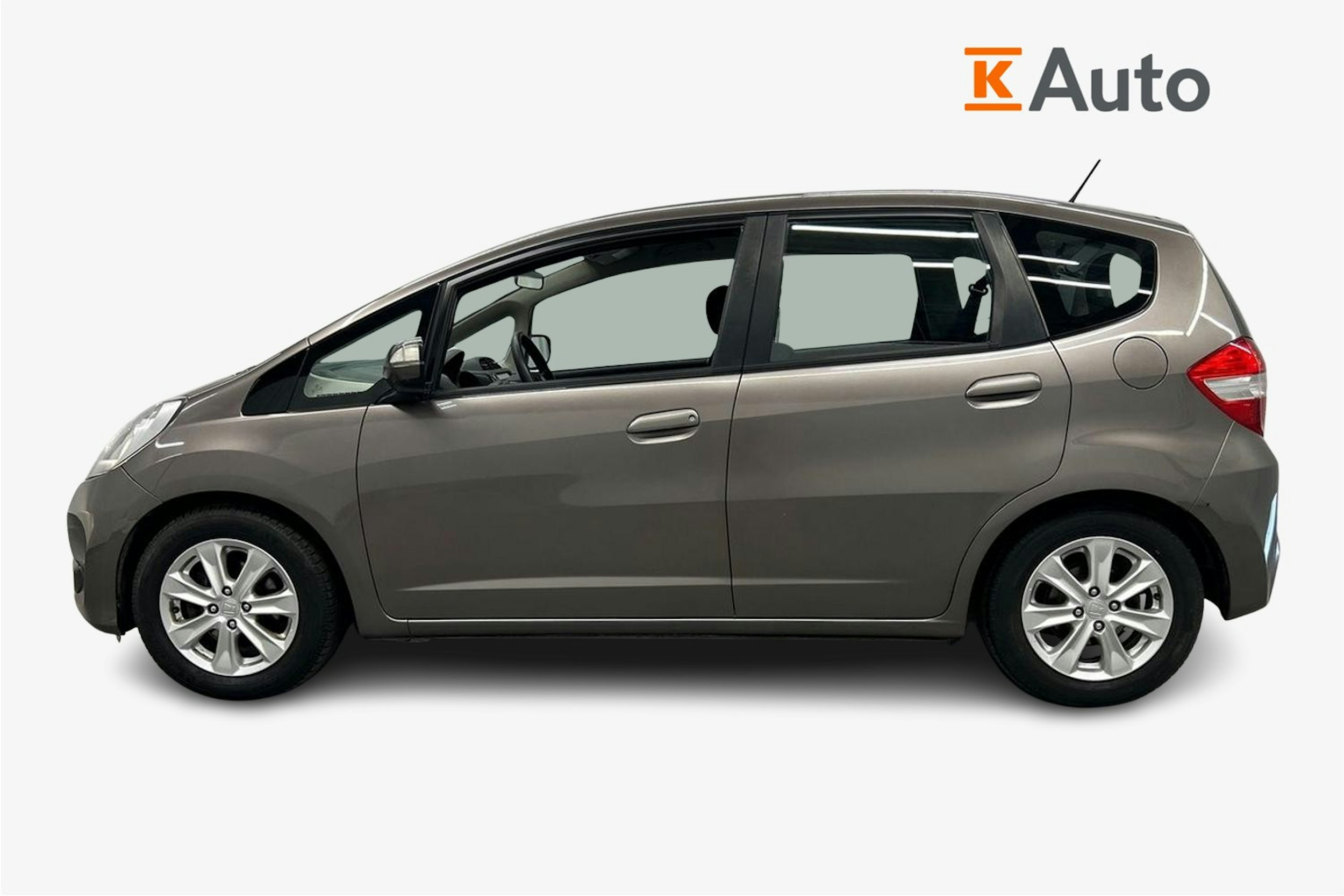 ruskea (beige) Honda Jazz 2011 kuva 6.