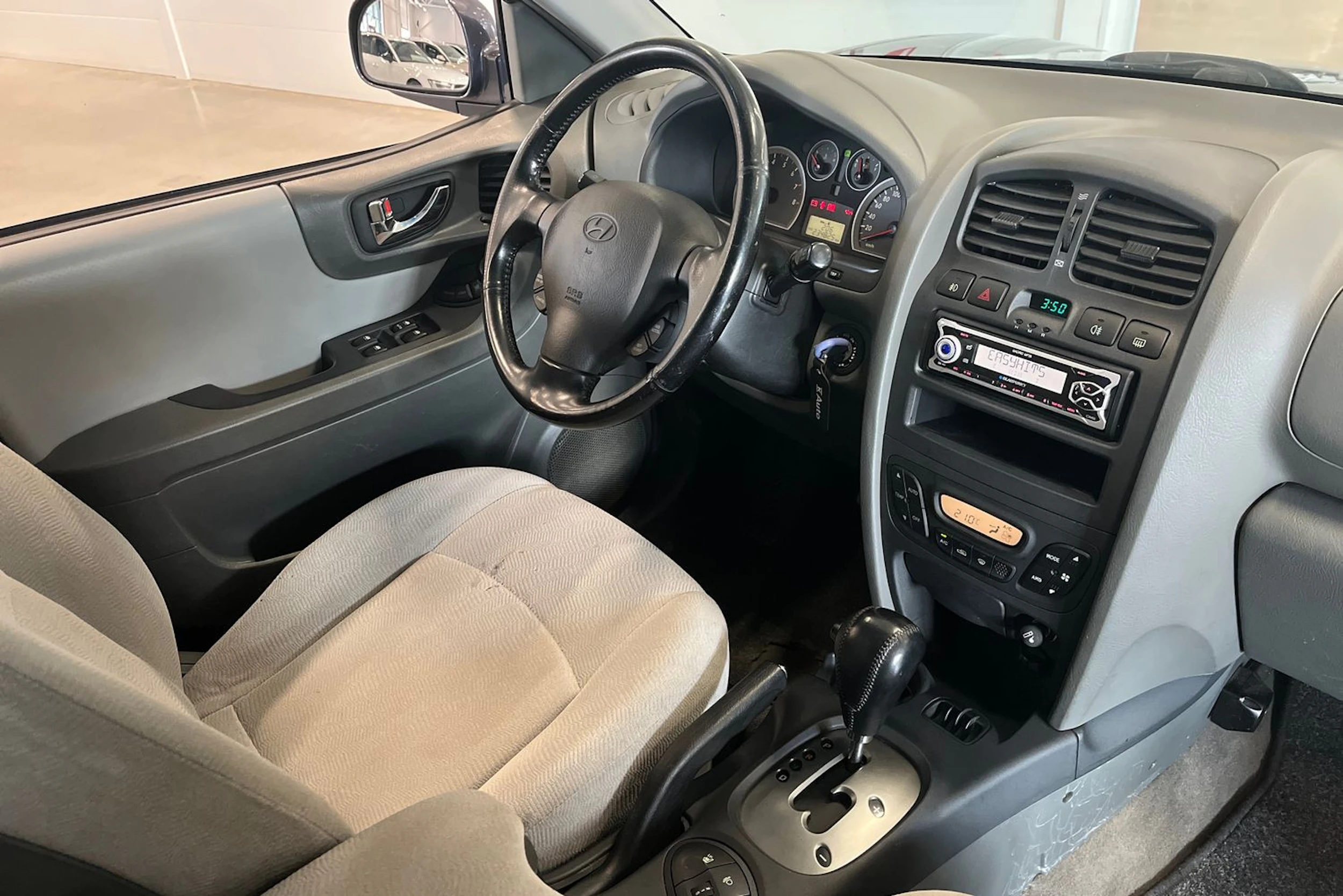 sininen Hyundai Santa Fe 2006 kuva 15.