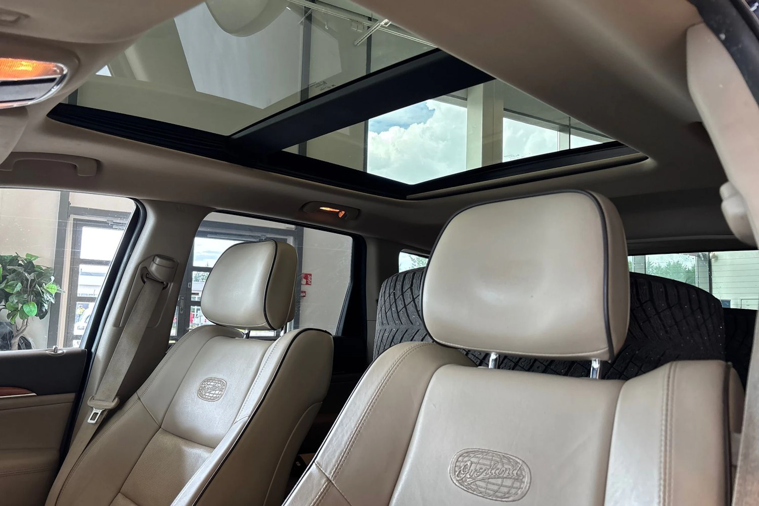 Sininen Jeep Grand Cherokee 2013 kuva 4.