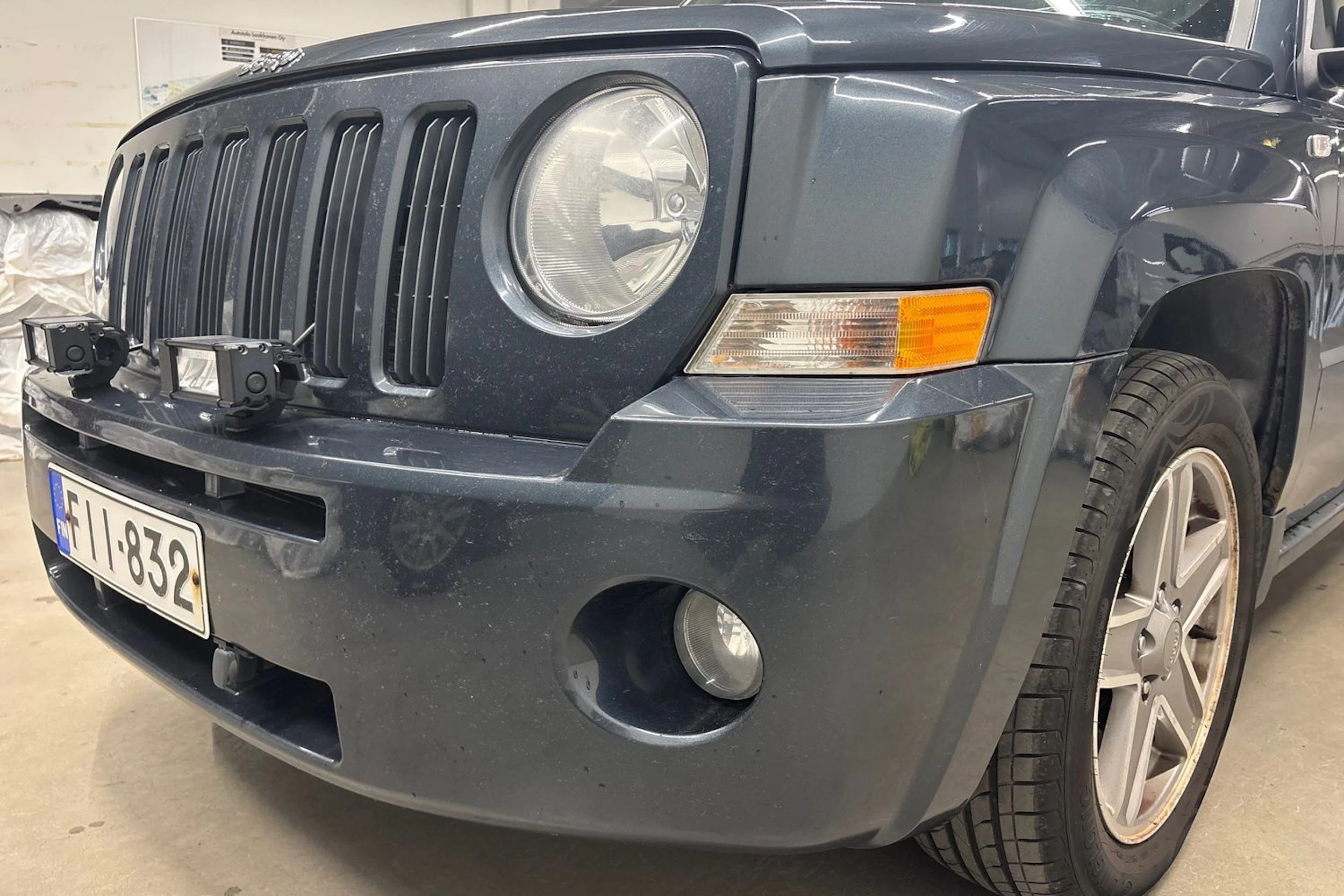 Harmaa Jeep Patriot 2010 kuva 26.