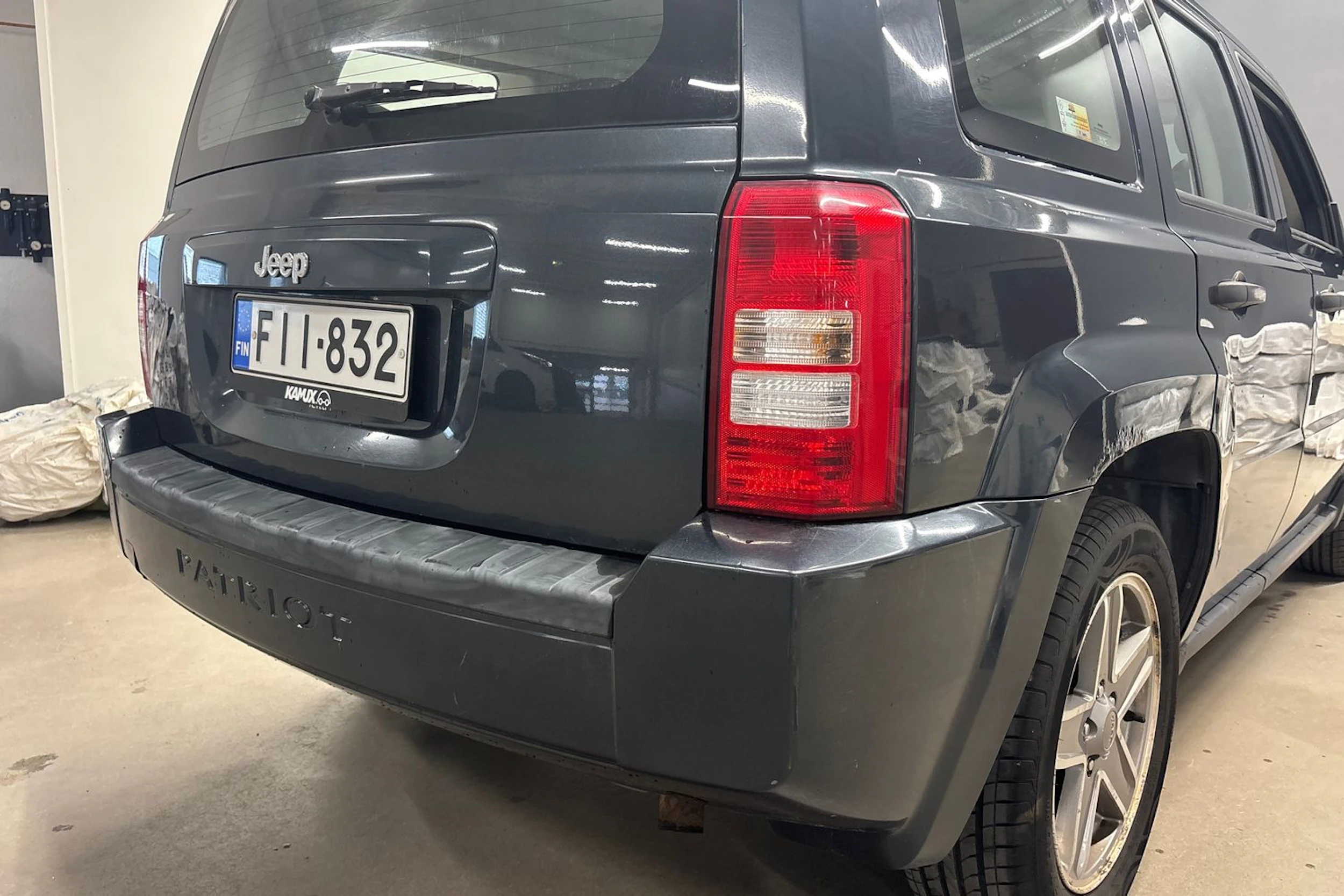 Harmaa Jeep Patriot 2010 kuva 31.