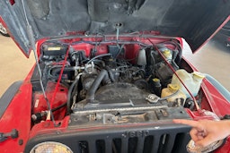 Punainen Jeep Wrangler 1997 kuva 19.